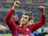 FC Steaua's Vlad Chiriches celebrates his team's win against Chelsea during the Europa League on March 7, 2013