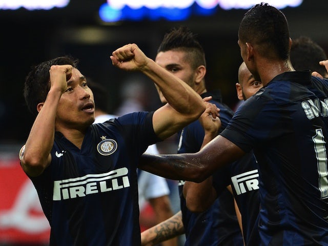 Inter's Yuto Nagatomo celebrates after scoring against Genoa on August 25, 2013