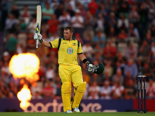 Aaron Finch of Australia celebrates making 150 runs during the 1st NatWest Series T20 match between England and Australia at Ageas Bowl on August 29, 2013