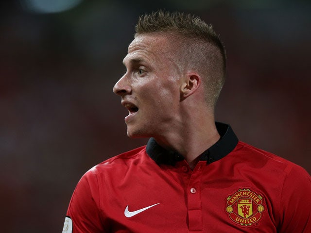 Alex Buttner #28 of Manchester United argues a call during the friendly match between Singha All Star XI and Manchester United at Rajamangala Stadium on July 13, 2013
