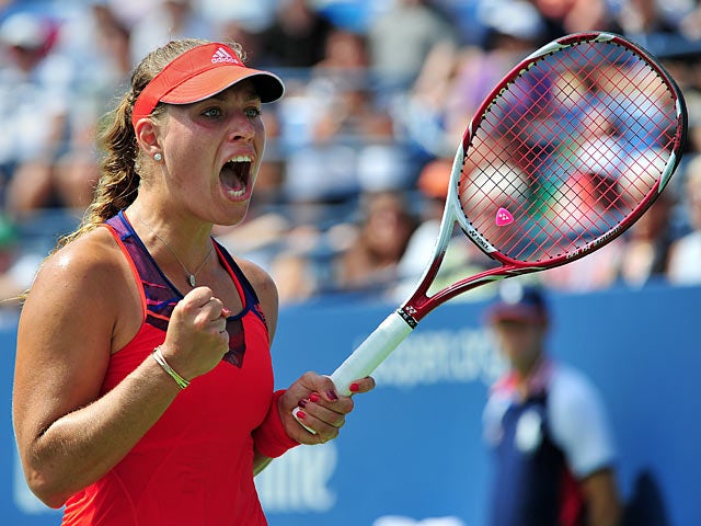 Angelique Kerber celebrates her win against Eugenie Bouchard during the second round of the US Open on August 29, 2013