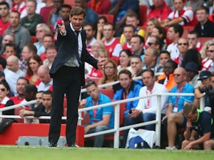 Andre Villas-Boas of Tottenham Hotspur gesticulates during the Barclays Premier League match between Arsenal and Tottenham Hotspur at Emirates Stadium on September 01, 2013
