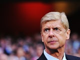 Arsenal manager Arsene Wenger prior to kick-off in the Champions League play-off match against Fenerbahce on August 27, 2013