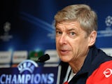Arsene Wenger talks to the press before an Arsenal Champions League game.