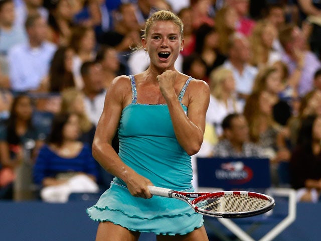 Camila Giorgi of Italy celebrates victory during her women's singles third round match against Caroline Wozniacki of Denmark on Day Six of the 2013 US Open at the USTA Billie Jean King National Tennis Center on August 31, 2013