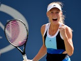 Caroline Wozniacki celebrates her win over Ying-Ying Duan during the first round of the US Open on August 27, 2013