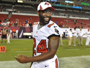 Cornerback Darrelle Revis #24 of the Tampa Bay Buccaneers leaves the field after the game against the Washington Redskins August 29, 2013