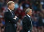 Opposing bosses David Moyes and Jose Mourinho look on as their sides do battle at Old Trafford on August 26, 2013