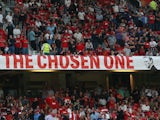 United fans display a banner in the Stretford End stating David Moyes is 'The Chosen One' on August 26, 2013