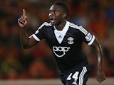 Southampton's Emmanuel Mayuka celebrates after scoring his team's third goal against Barnsley during their League Cup match on August 27, 2013