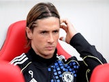 Fernando Torres sitting on the bench during Chelsea's match with Sunderland in 2011.