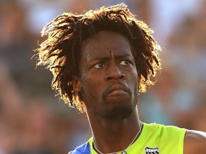 Monfils eases into second round