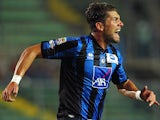 Atalanta 's Guglielmo Stendardo celebrates after scoring the opening goal against Torino on September 1, 2013