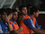 Real Madrid 'keeper Iker Casillas looks frustrated on the bench during a game with Grenada on August 26, 2013