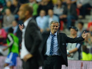 Chelsea boss Jose Mourinho appeals the sending off of Ramires against Bayern on August 30, 2013