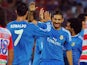 Real's Karim Benzema celebrates with Cristiano Ronaldo after a goal against Grenada on August 26, 2013