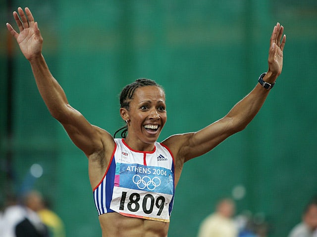 Great Britain's Kelly Holmes celebrates after winning gold in the women's 800 metre final during the Olympic Games in Athens on August 24, 2004