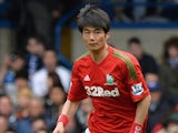 Swansea City's South Korean midfielder Ki Sung-Yeung runs with the ball during the English Premier League football match between Chelsea and Swansea City at Stamford Bridge in London on April 28, 2013