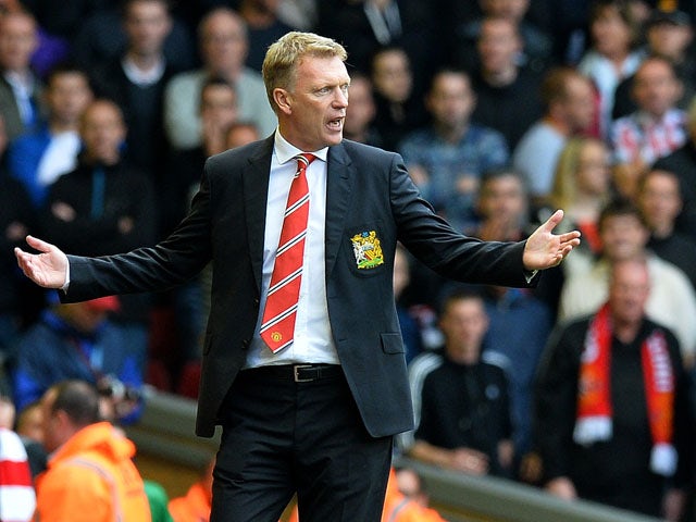Manchester United's Scottish manager David Moyes reacts during the English Premier League football match between Liverpool and Manchester United at the Anfield stadium in Liverpool, northwest England, on September 1, 2013