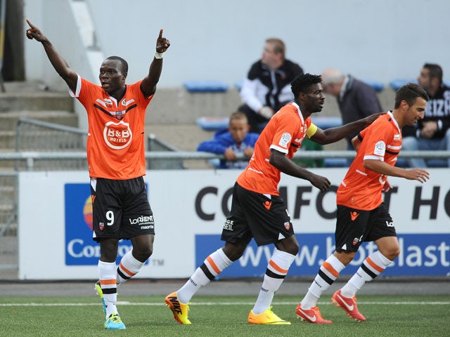 Lorient's forward Vincent Aboubakar celebrates after scoring a goal during a French Ligue 1 football match between Lorient and Valenciennes on August 31, 2013