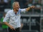 Moenchengladbach coach Lucien Favre barks orders at his team during a game with Hannover on August 17, 2013