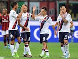 Cagliari's Marco Sau celebrates his goal with team mates during the match against AC Milan on September 1, 2013