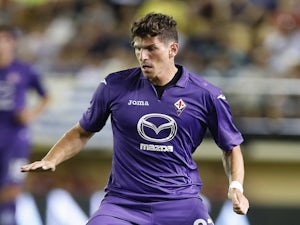 Gomez double sends Fiorentina into quarter-finals