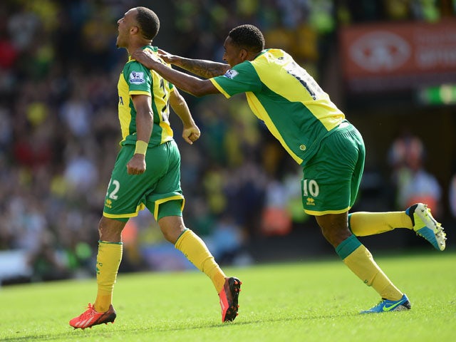 Nathan Redmond of Norwich City celebrates his goal during the Barclays Premier League match between Norwich City and Southampton at Carrow Road on August 31, 2013