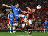 Chelsea's Oscar vies for the ball with Nemanja Vidic on August 26, 2013