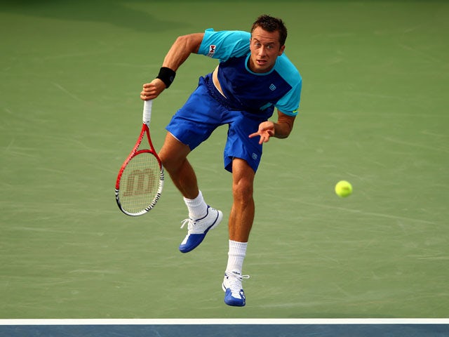 Philipp Kohlschreiber of Germany serves during his men's singles third round match against John Isner of United States of America on Day Six of the 2013 US Open at USTA Billie Jean King National Tennis Center on August 31, 2013