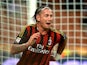 Milan's Philippe Mexes celebrates after scoring his team's second goal against Cagliari on September 1, 2013