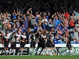 Tendayi Darikwa of Chesterfield celebrates with team-mates after scoring their second goal during the Sky Bet League Two match between Portsmouth and Chesterfield at Fratton Park on August 31, 2013 