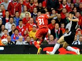 Liverpool's Raheem Sterling scores the opening goal against Notts County during their League Cup match on August 27, 2013