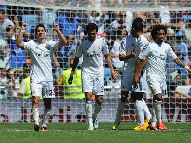 Isco of Real Madrid celebrates after scoring Real's 3rd goal during the La Liga match between Real Madrid CF and Athletic Club Bilbao at estadio Santiago Bernabeu on September 1, 2013