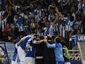 Real Sociedad players celebrate after Carlos Vela gives them the lead against Lyon on August 28, 2013