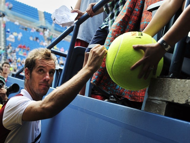 Richard Gasquet leaves the court following a win at the US Open on August 26, 2013