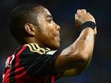 Milan's Robinho celebrates after scoring the opening goal against Cagliari on September 1, 2013