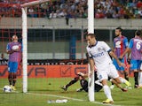 Inter's Rodrigo Palacio celebrates after scoring the opening goal against Catania on September 1, 2013