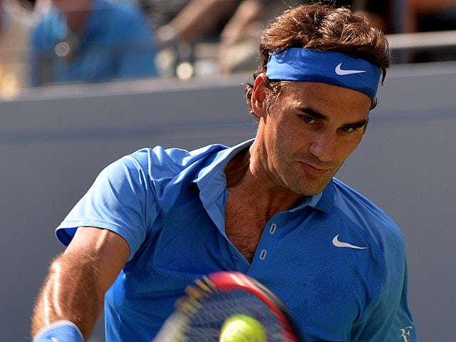 Roger Federer in action during the match against Grega Zemlja during the first round of the US Open on August 27, 2013