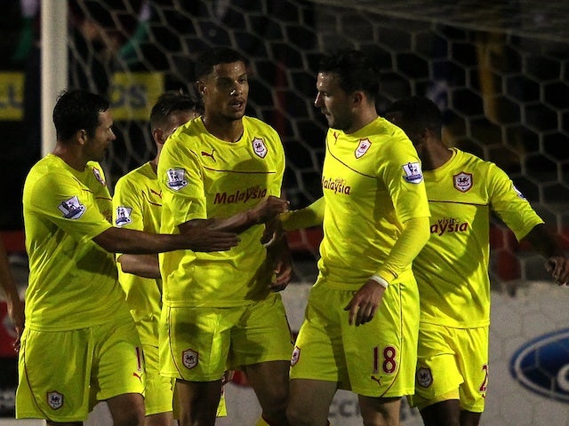 Cardiff players congratulate Rudy Gestede after his goal against Accrington Stanley on August 28, 2013