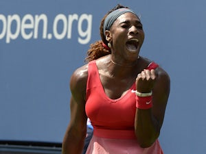 Serena Williams celebrates her win against Galina Voskoboeva during the second round of the US Open on August 29, 2013