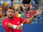 Stanislas Wawrinka in action against Marcos Baghdatis during their US Open third round match on September 1, 2013
