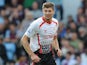 Liverpool's English midfielder Steven Gerrard runs with the ball during the English Premier League football match between Aston Villa and Liverpool at Villa Park in Birmingham on August 24, 2013