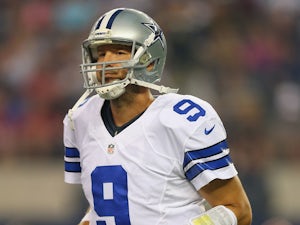 Romo guides Cowboys to victory