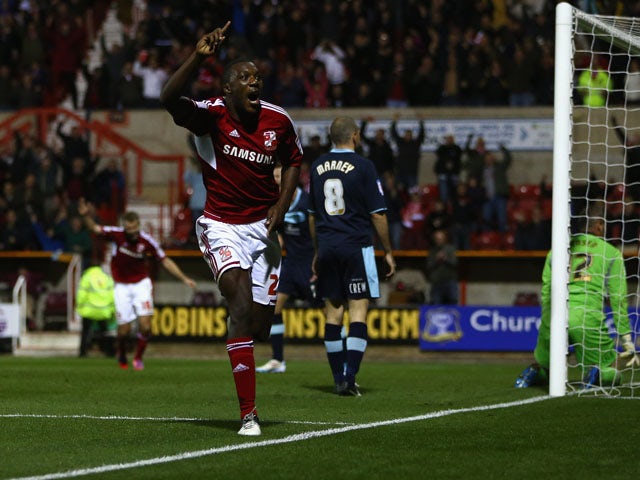 Troy Archibald-Henville of Swindon Town celebrates scoring his sides third goal during the Capital One Cup Third Round match between Swindon Town and Burnley at the County Ground on September 25, 2012