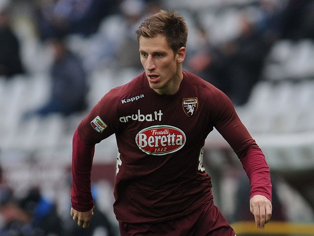 Valter Birsa of Torino FC in action during the Serie A match between Torino FC and Atalanta BC at Stadio Olimpico di Torino on February 17, 2013