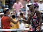Venus Williams shakes the hand of Kirsten Flipkens following their US Open match on August 26, 2013