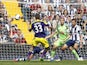 Swansea City's Welsh defender Ben Davies scores his goal past West Bromwich Albion's Welsh goalkeeper Boaz Myhill during the English Premier League football match between West Bromwich Albion and Swansea City at The Hawthorns in West Bromwich on September