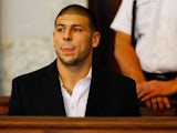 Aaron Hernandez sits in the courtroom of the Attleboro District Court during his hearing on August 22, 2013
