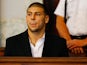 Aaron Hernandez sits in the courtroom of the Attleboro District Court during his hearing on August 22, 2013